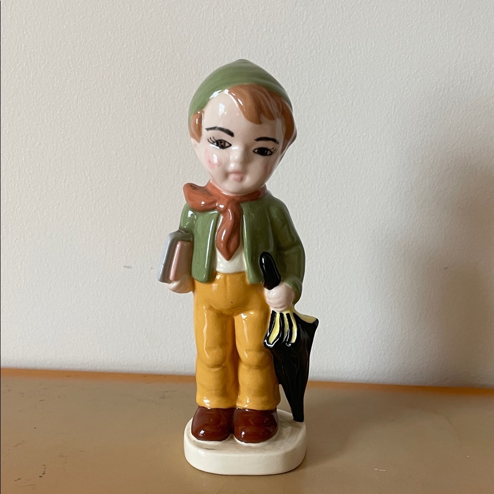 Vintage Porcelain Boy Figurine with Umbrella and Books ‘77